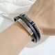 Stainless Steel. Multi-strand leather bracelet